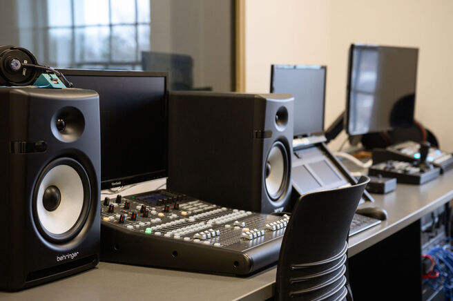 creativity lab showing mixing board and speakers